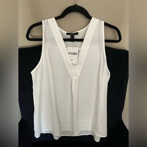 White sleeveless tank top. New with tags on it from forever 21.